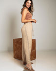 PANTALÓN PALAZO BRILLO LATERAL